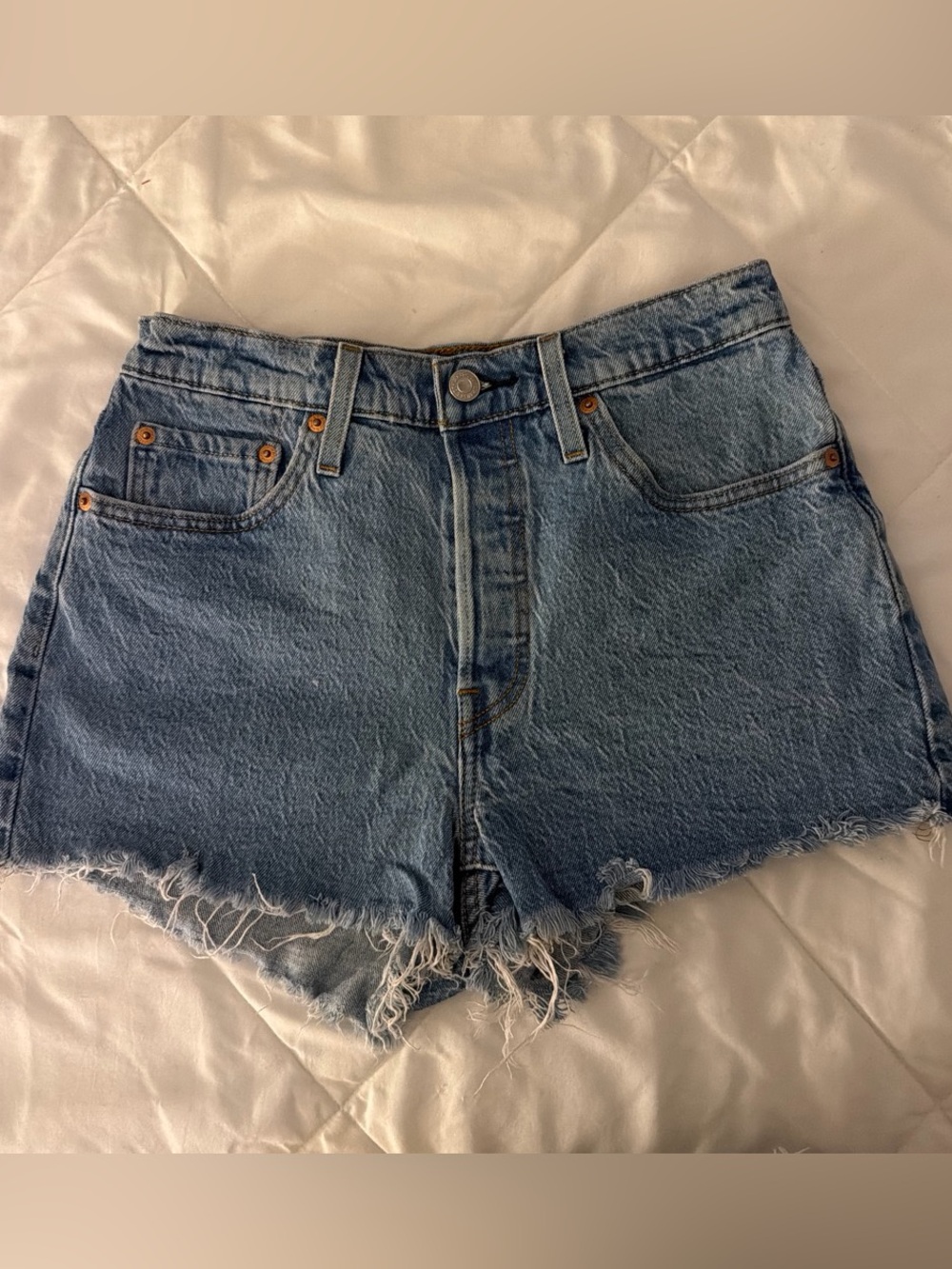 Levi’s High-Rise Blue Denim Cutoff Shorts